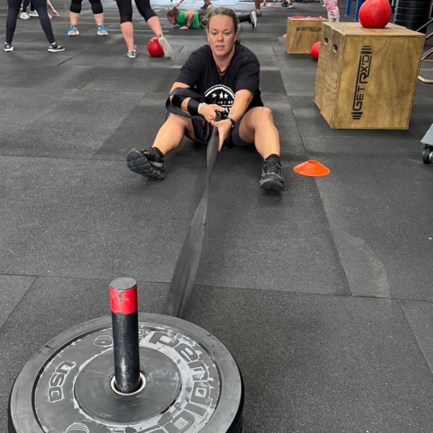 woman pulling a sled